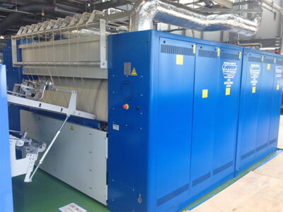 ガスバーナー搭載、オイル循環式ロールアイロナーで、高生産+省エネを実現