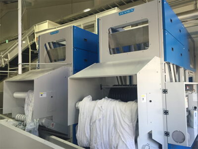 ロール前省人化の決定版、ジェンセンバイキング(捌き機)